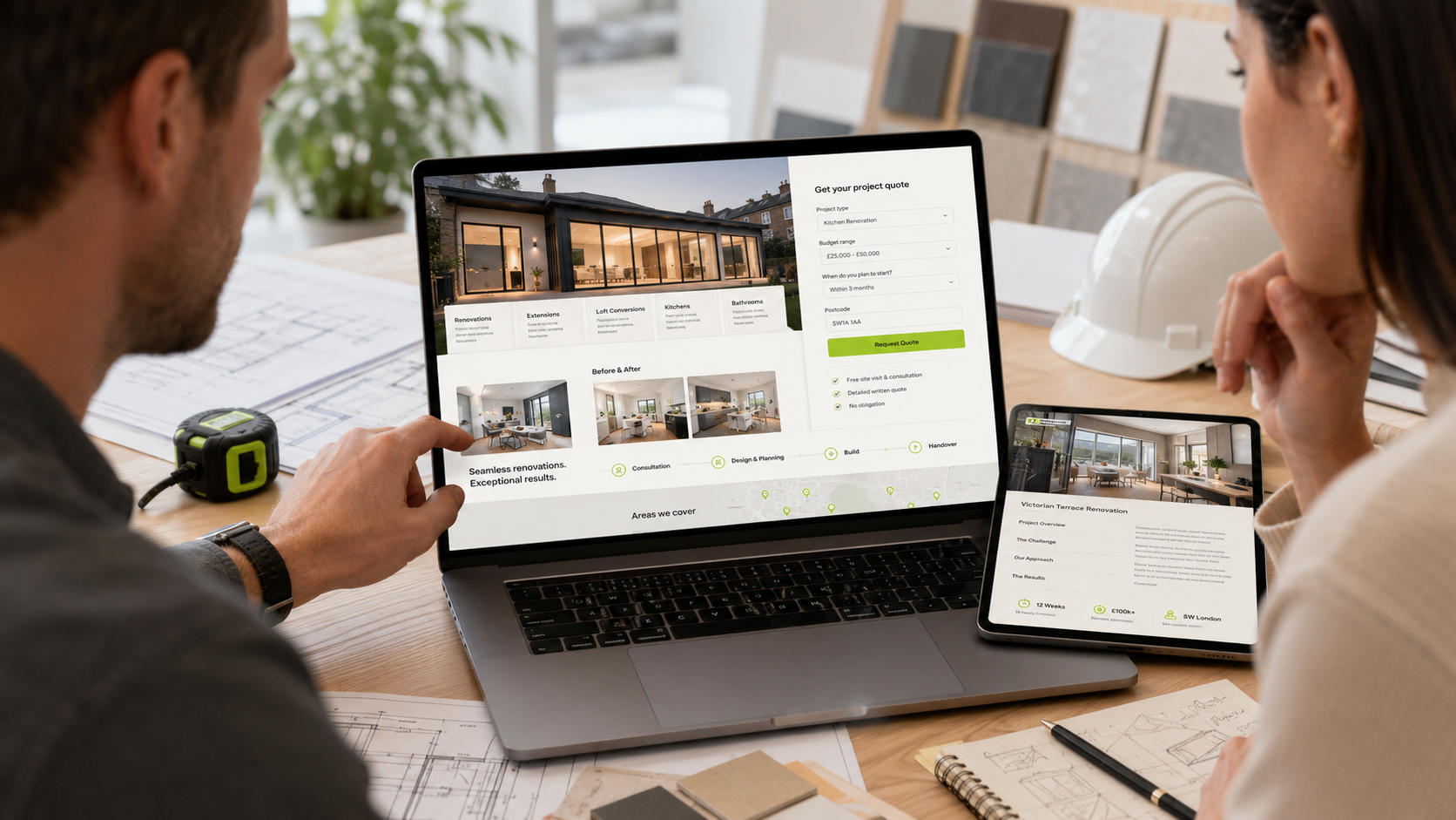 Two coworkers review a renovation project website on a laptop, showing a modern home interior and a quote form on the side panel.